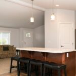 Skyline Homes Westridge 1216CT Manufactured Home Kitchen featuring island, walk-in pantry, appliances, small window