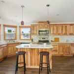 Skyline Homes Westridge 1218CT Manufactured Home Kitchen featuring island, appliances, and ceiling lights