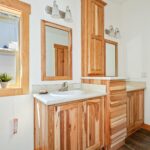 Skyline Homes Westridge 1218CT Manufactured Home Primary bathroom featuring double vanity and small window