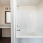 Skyline Homes Westridge 1227CT Manufactured Home Master bathroom shower bath and single vanity