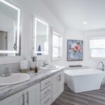Skyline Homes Westridge 1260CT Manufactured Home Master bathroom featuring double vanity, garden bathtub, walk-in closet, linen closet, toilet