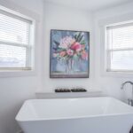 Skyline Homes Westridge 1260CT Manufactured Home Master bathroom featuring double vanity, garden bathtub, walk-in closet, linen closet, toilet
