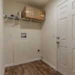 utility closet with washer and dryer hookup